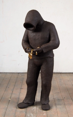 Xiliphus 2010 fired black clay H: 140 cm private collection Lieshout